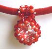 Pendentif Tinos rouge sur cuir rouge