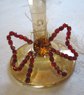 noeud papillon en perles pour table de noel rouge