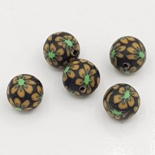 Perle pâte polymère fond Noir et fleurs 12 mm