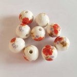 Perle ronde céramique fantaisie fleur 14 mm N°01