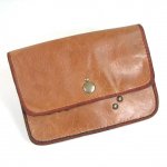 Pochette cuir pour ceinture, sûre et discrète. Accessoire pratique et élégant.