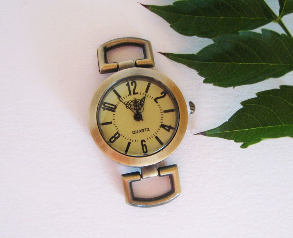 Antique bronze round watch face