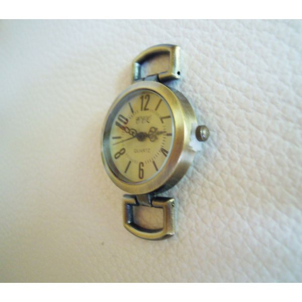 Antique bronze round watch face