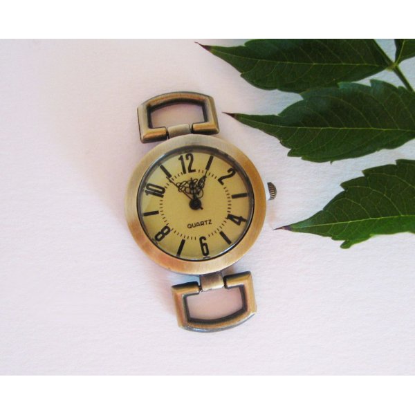 Antique bronze round watch face
