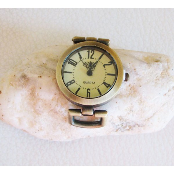 Antique bronze round watch face