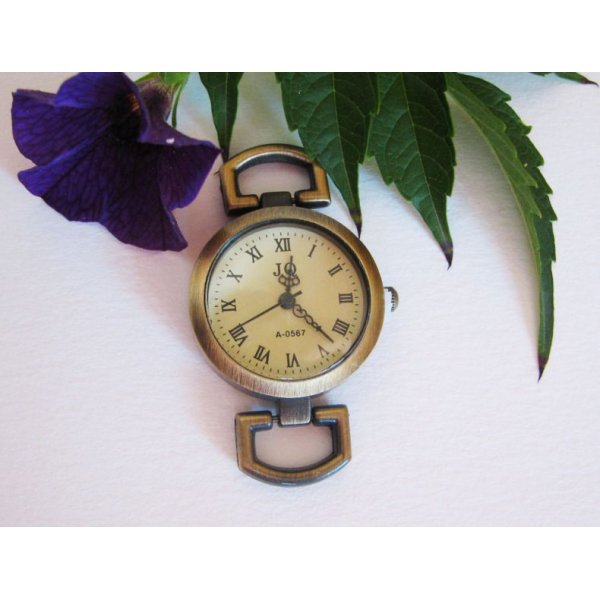 Antique bronze round watch face