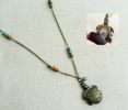 Sautoir pendentif gousset tortue aux perles 