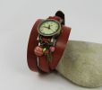 Montre cuir paprika breloques et pierres orange