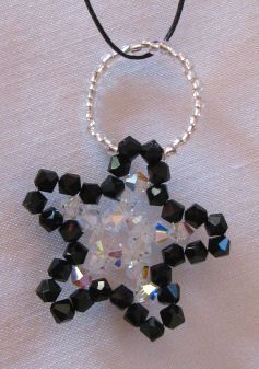 Black and crystal Christmas star pattern