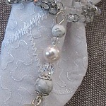 Kit rond de serviette Blanc/argent avec grelot