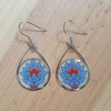 Boucles d'oreille pendantes fleur orientale bleue