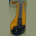 Grand cutter avec lame rétractable