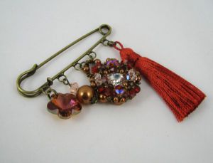 Broche Swarovski pompon