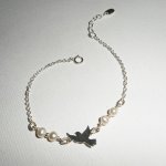 Bracelet en perles de culture avec colombe en argent 925