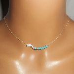 Collier ras de cou en argent 925 avec petit dauphin et pierres turquoise