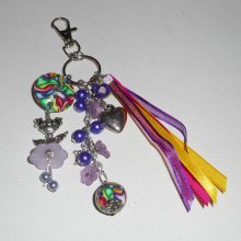 Porte clés/Bijoux de sac poupée violet avec perles et rubans multicolores