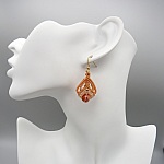 Paire de boucles d'oreilles bleues avec des perles en cornaline