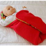 Couverture pour bébé en double polaire unie et à motifs robots