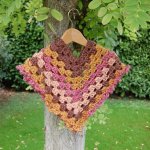 Poncho enfant couleur rose, moutarde et marron