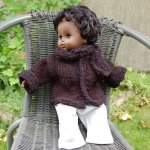 Manteau noir pour poupée avec son écharpe