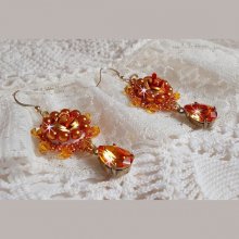 Boucle d'oreilles Lady in Orange crées en Crystal de Swarovski, rocailles et perles orangées.