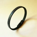 Bracelet cuir noir doubles surpiqûres blanches taille ajustable