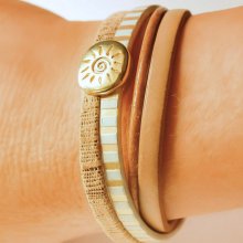 Bracelet manchette multi-liens en cuir et passant soleil doré