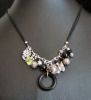 Collier anneau et breloques